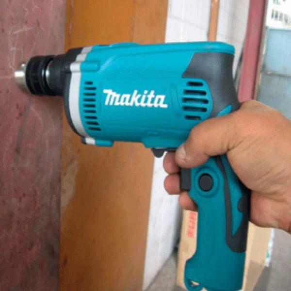 Makita High Impact Electric High Power 710 Watts Hammer Drill with rubberized soft grip, Ergonomically designed for comfort - HP1630X Makita High Impact Electric High Power 710 Watts Hammer Drill with rubberized soft grip, Ergonomically designed for comfort - HP1630X